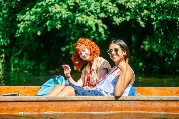 students sat in a boat in oxford lowres