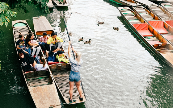 students in oxford on the river punting
