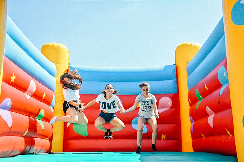 Students on Bouncy Castle