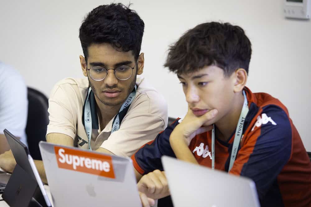 Two Oxford students studying